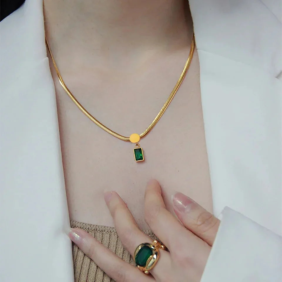 Luxurious Emerald snake chain necklace.